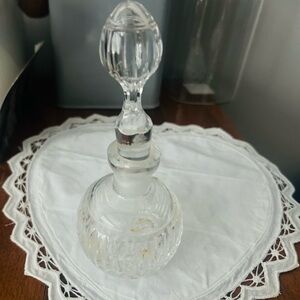 Elegant crystal bottle with stopper.
